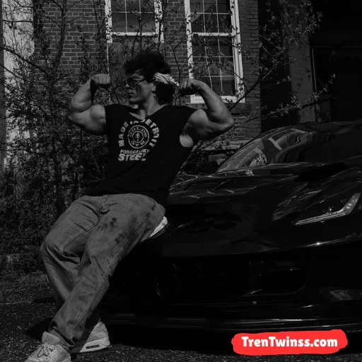 Tren Twins Posing With Cars