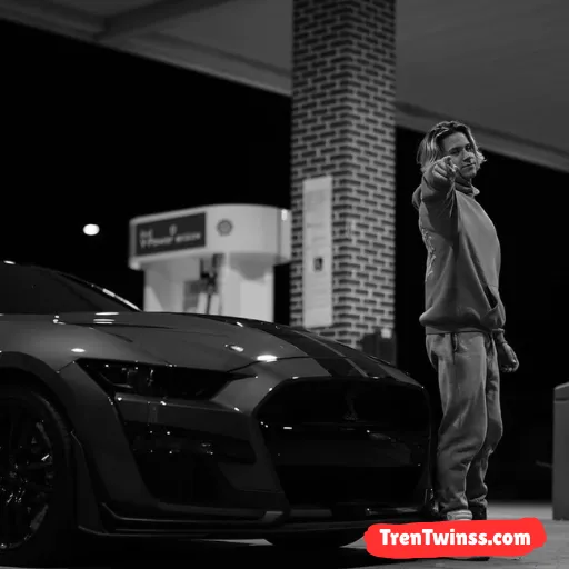 Tren Twins Posing With Cars