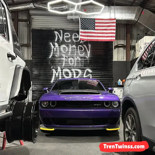 Tren Twins Posing With Cars